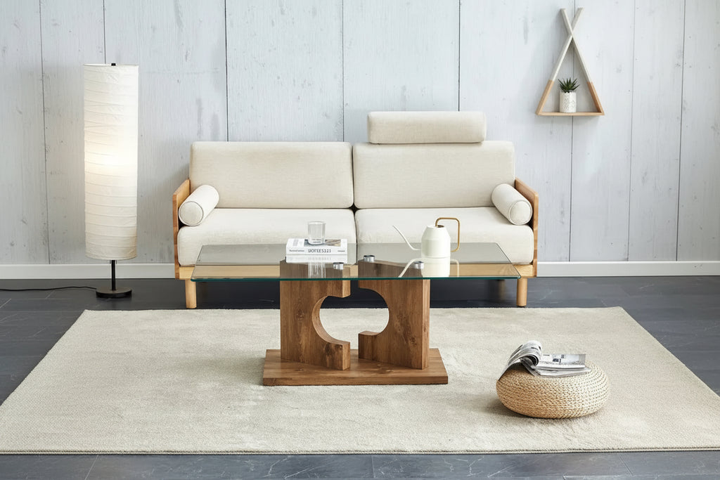 Une table basse rectangulaire moderne et tendance avec un plateau en verre trempé et des pieds en MDF blanc